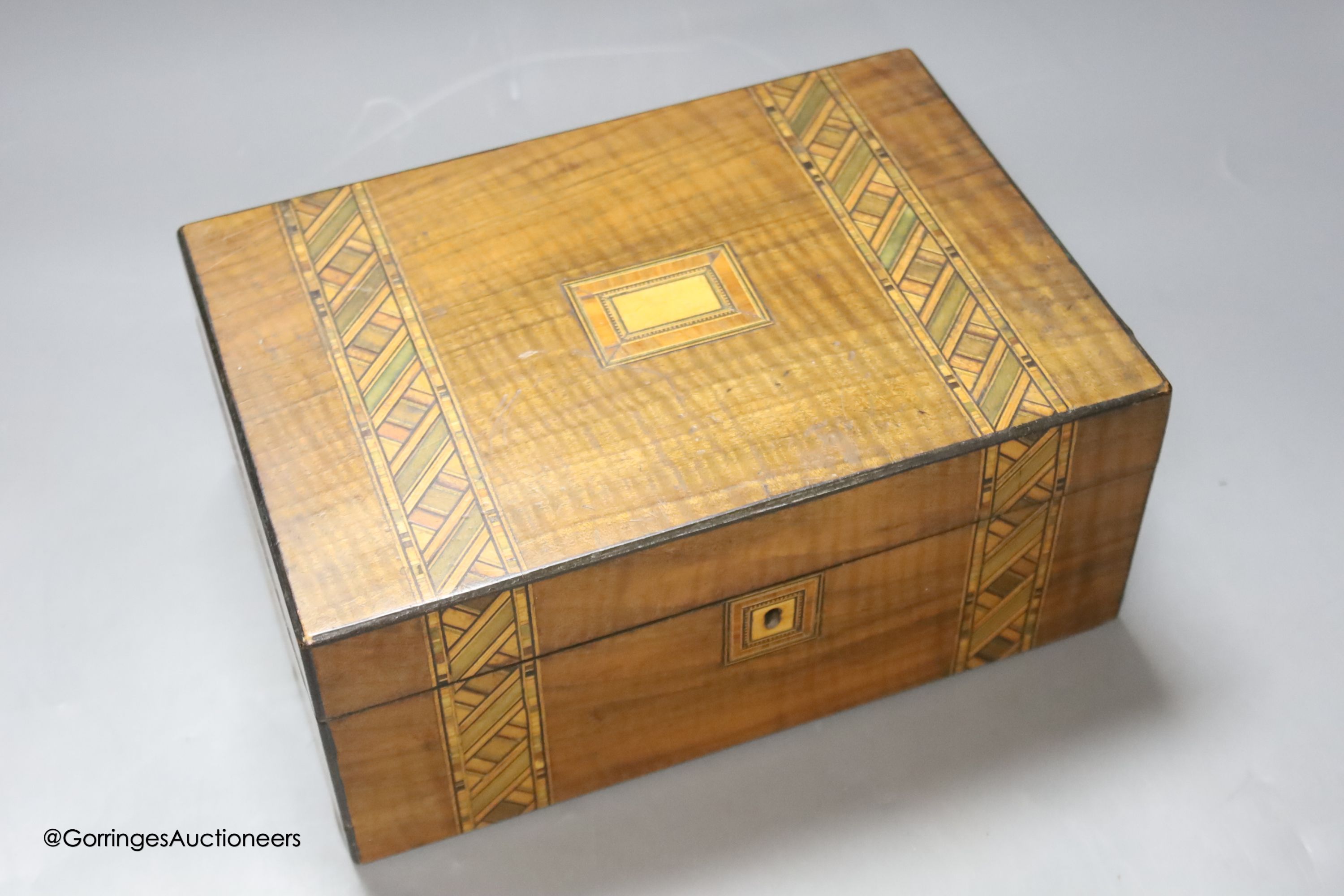 A Regency bird's eye maple work box, 13 cm high, 25 x 20cm and a parquetry box (2)